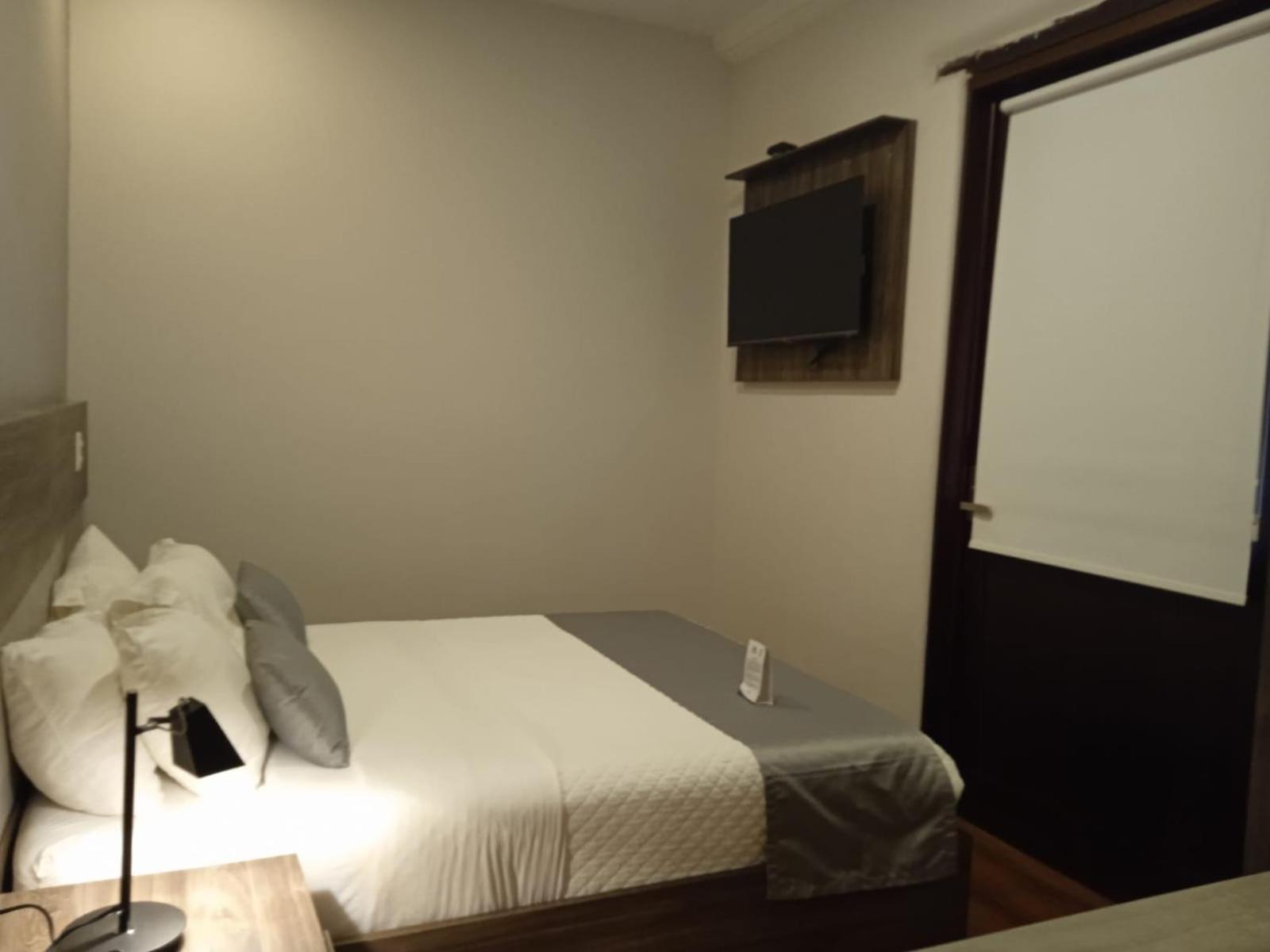 Hotel Raymipampa Cuenca Habitación foto