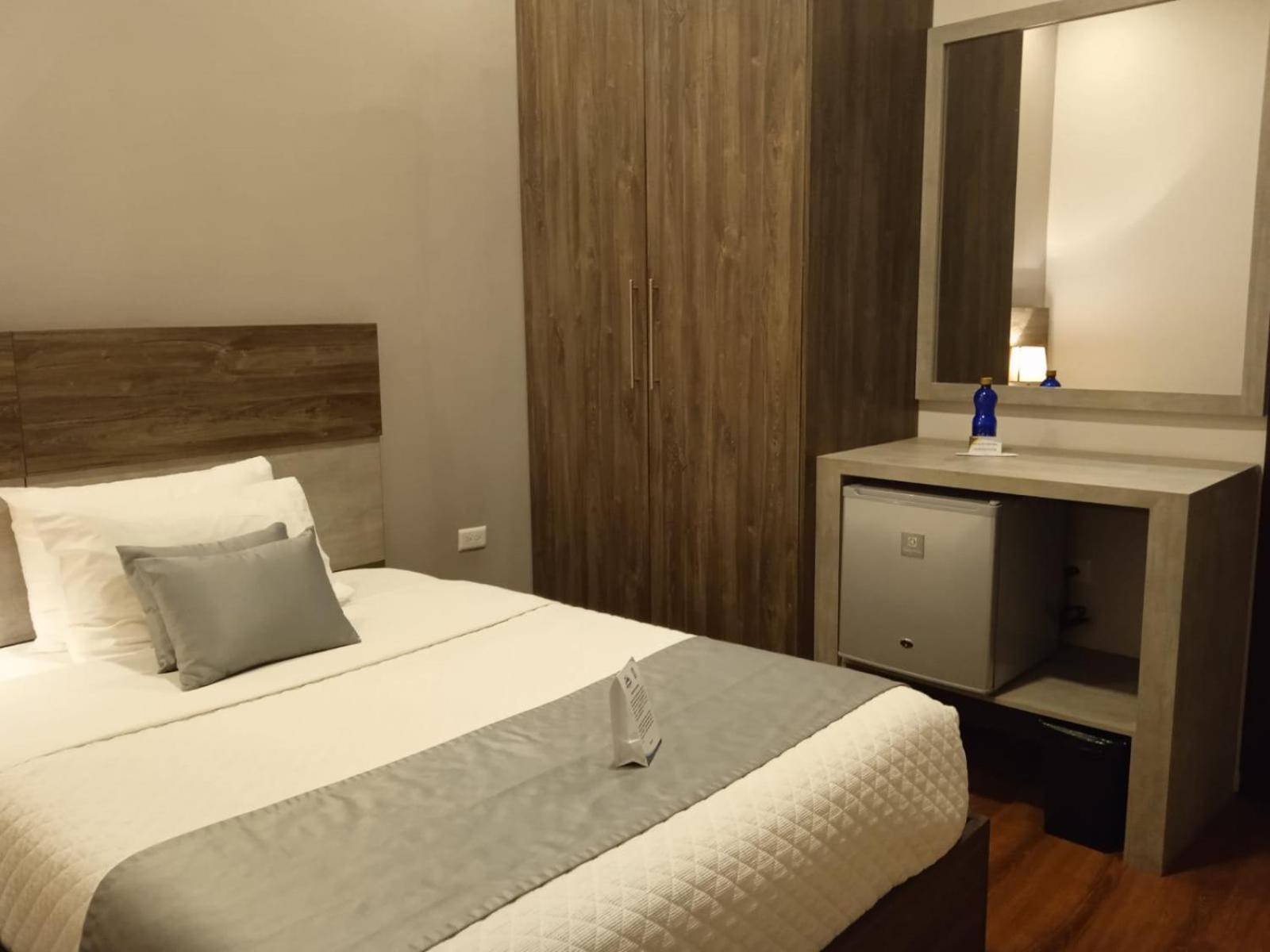 Hotel Raymipampa Cuenca Habitación foto