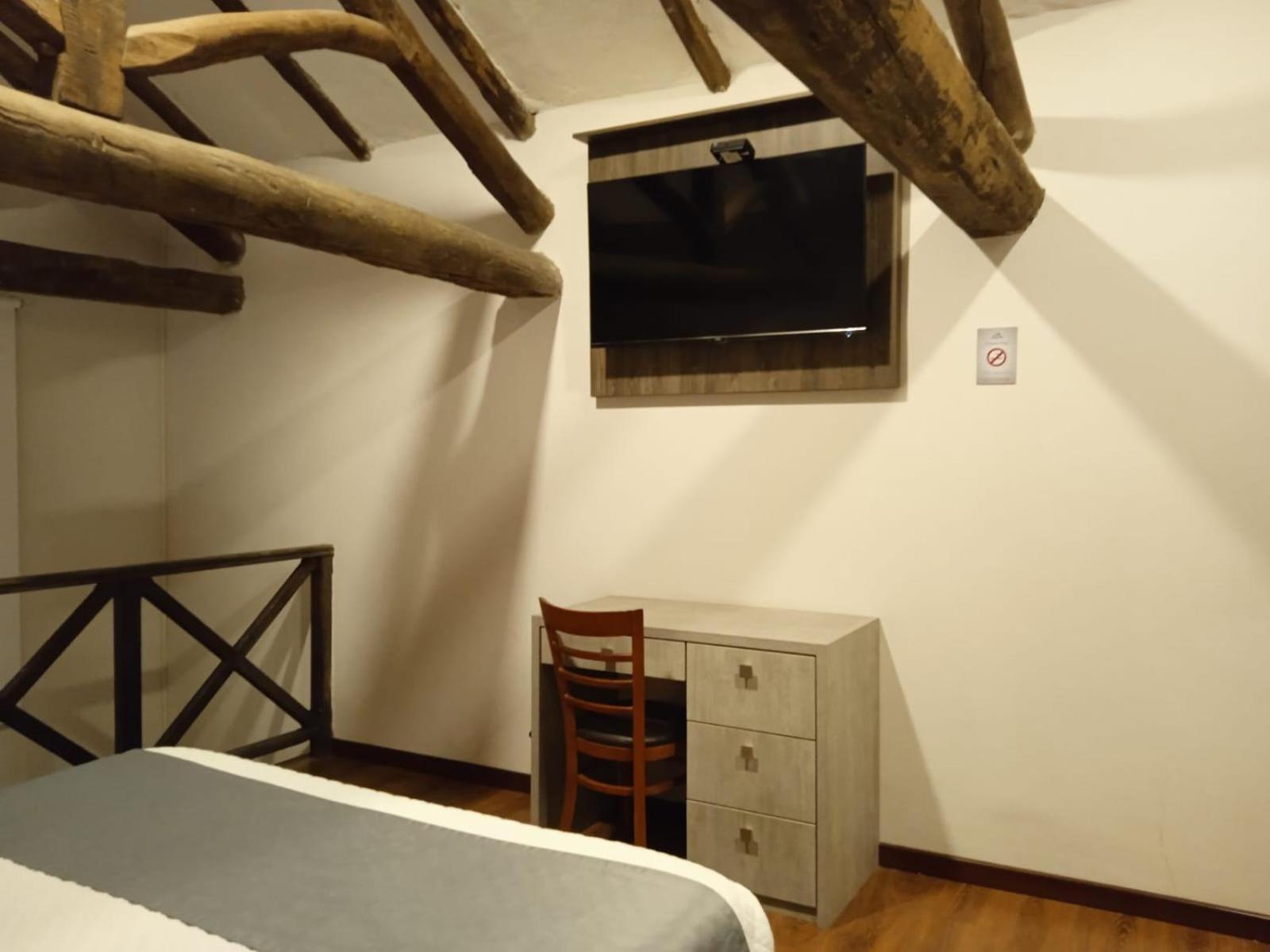 Hotel Raymipampa Cuenca Habitación foto